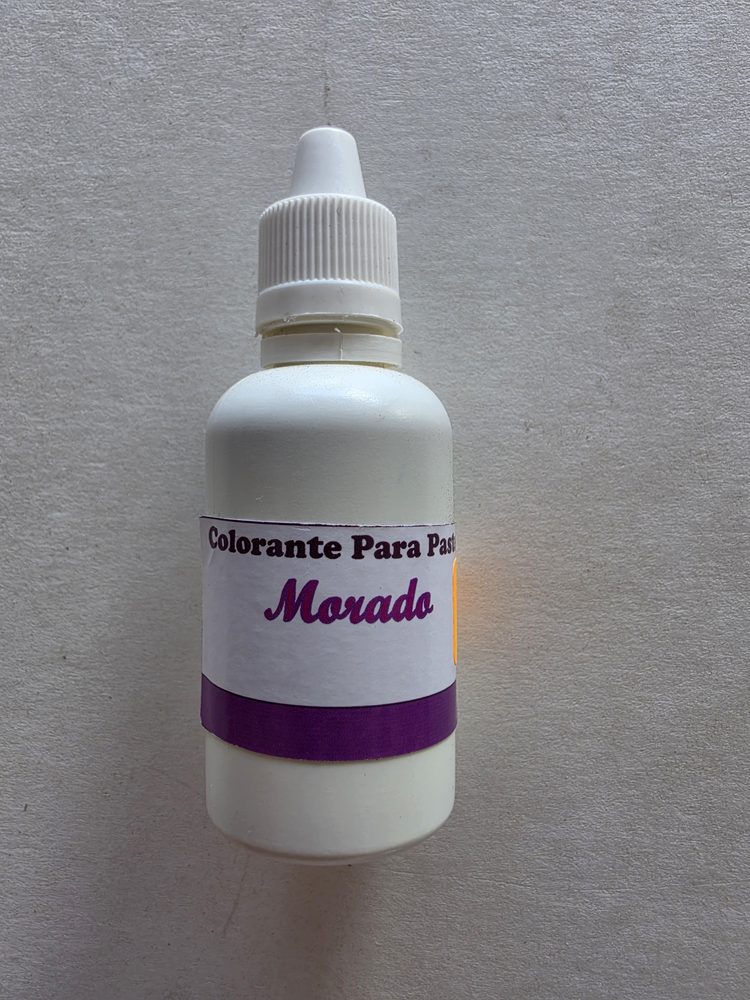 Frasco plástico blanco de colorante liquido morado para pasteles