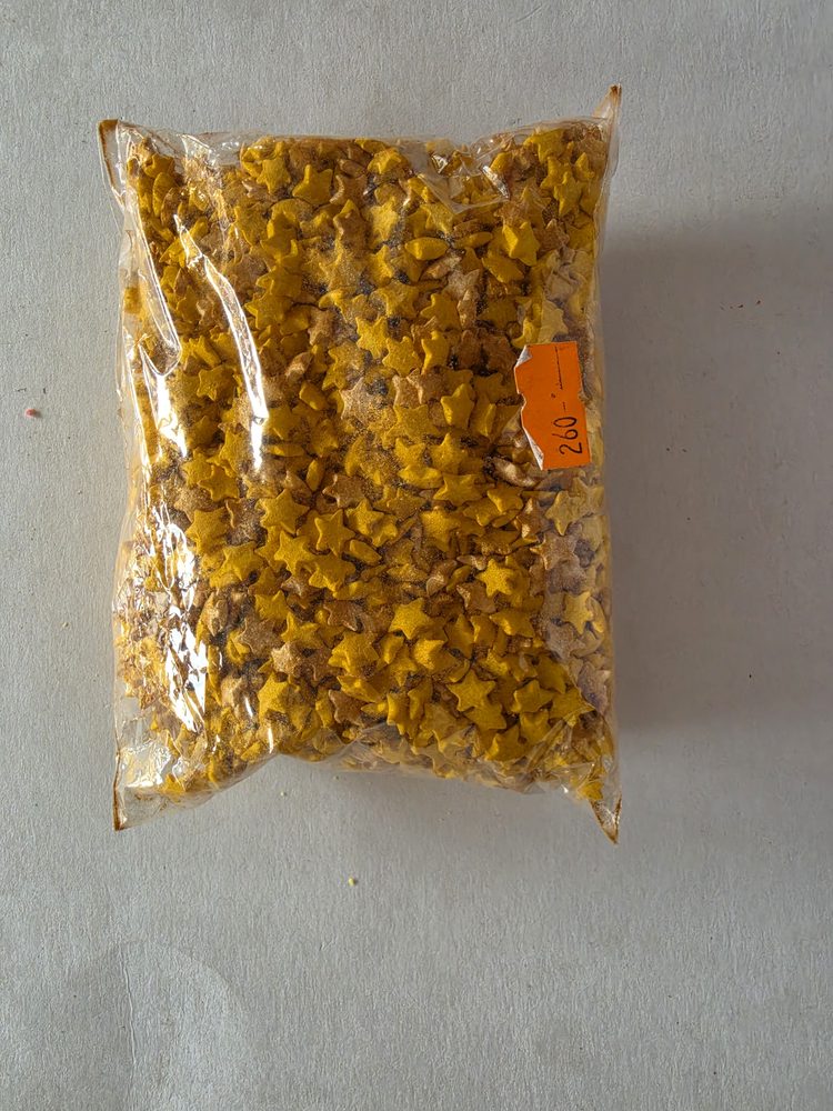 Bolsa grande de sprinkles en forma de estrella color amarillo dorado