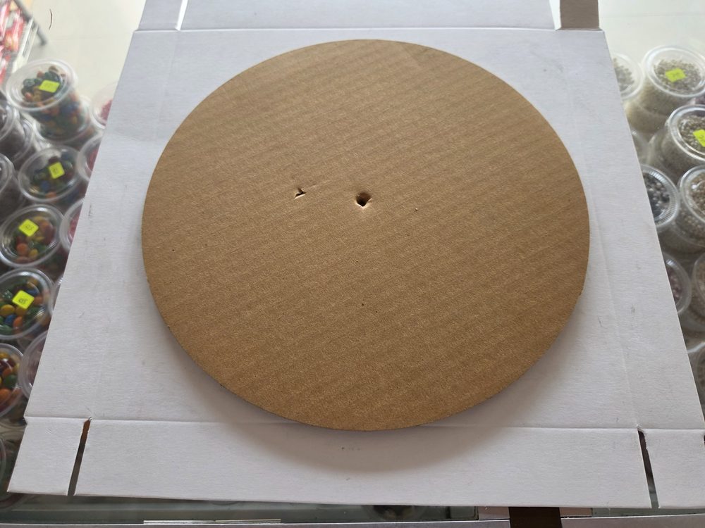 Base redonda de cartón sin forro, 1/2 lb