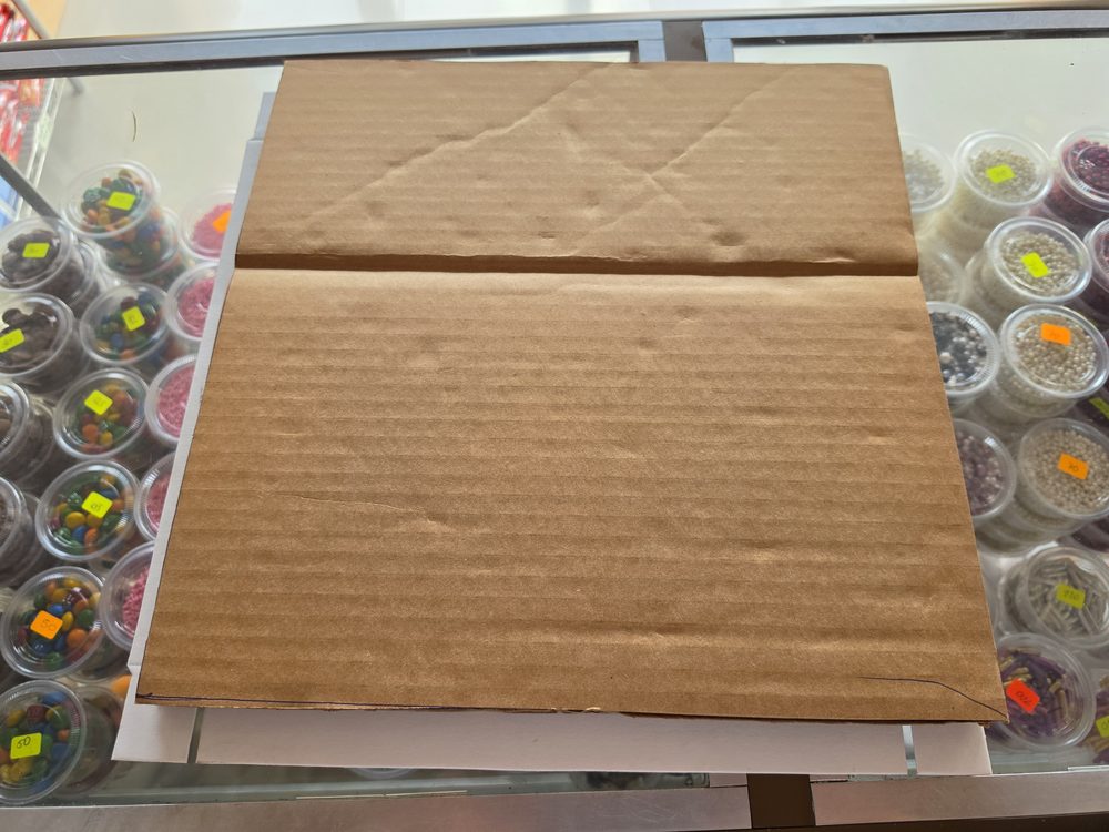 Base cuadrada de cartón sin forro, 1 lb