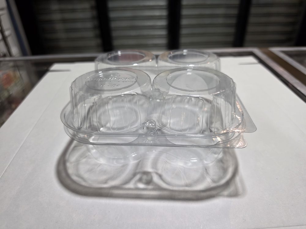 Envase desechable de plástico transparente para 4 cupcakes o muffins