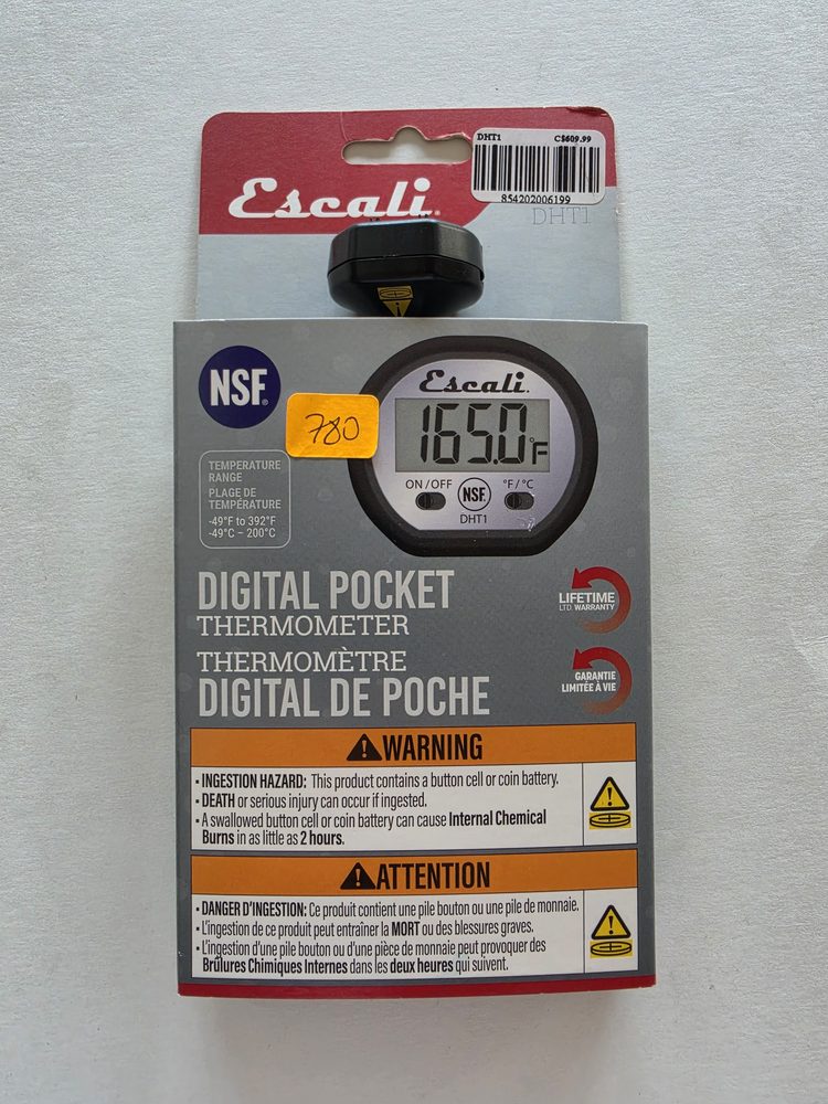 Termometro digital de bolsillo negro con caratula redonda, marca