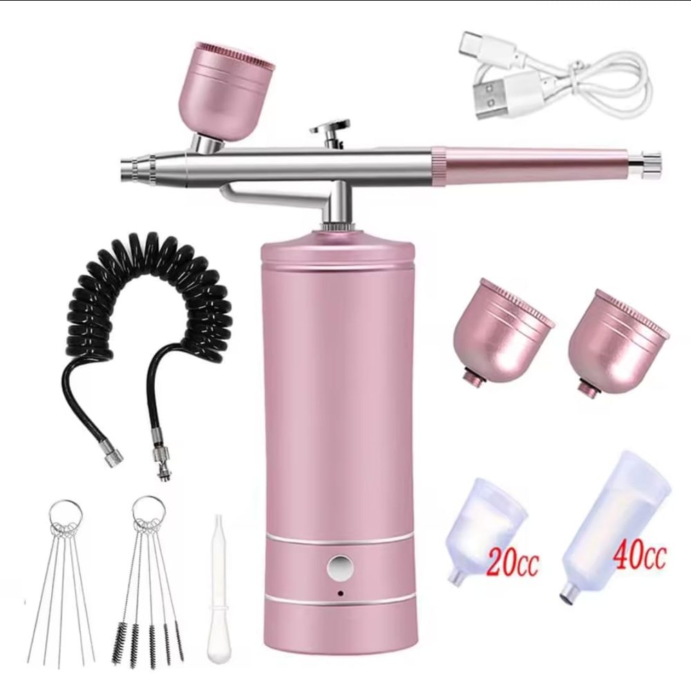 Kit de aerografo recargable color rosado con compresor integrado