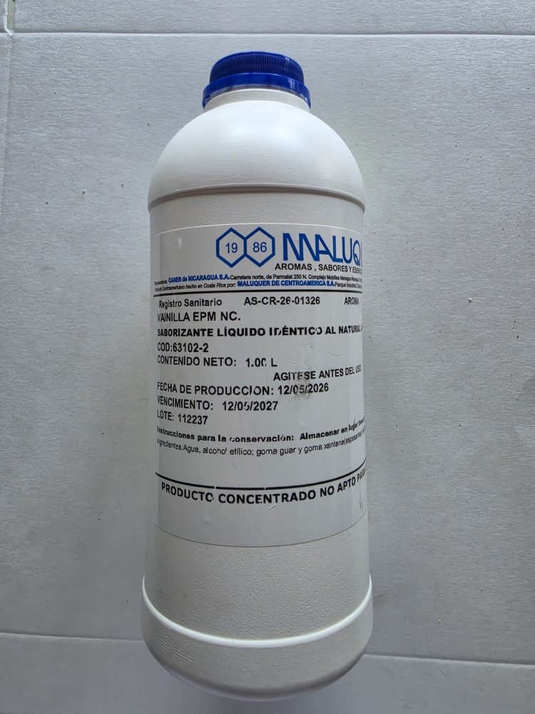Saborizante liquido de vainilla, botella plastica blanca de 1 litro