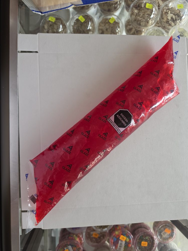 Manga de glaseado o brillo color rojo, empaque plástico impreso