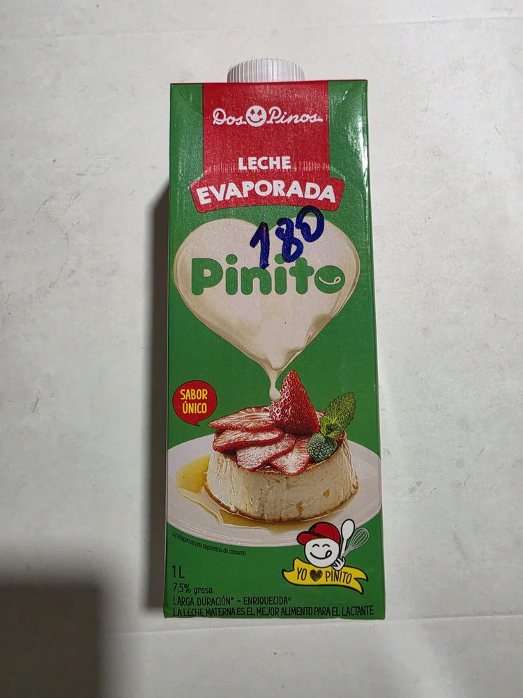 Caja tetrapak verde de leche evaporada Pinito Dos Pinos, 1 litro