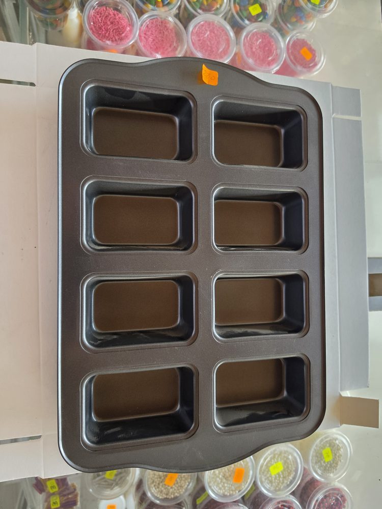 Molde antiadherente color gris oscuro para 8 mini panques